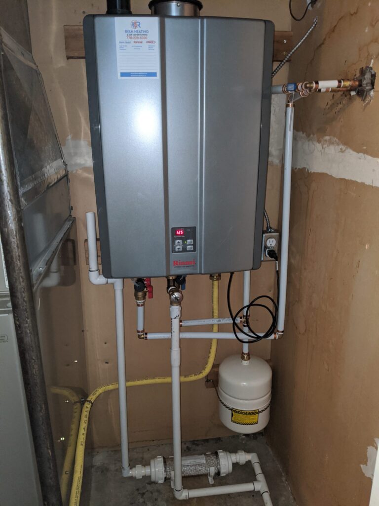 Rinnai tankless water heater installed in a Mississauga basement utility room
