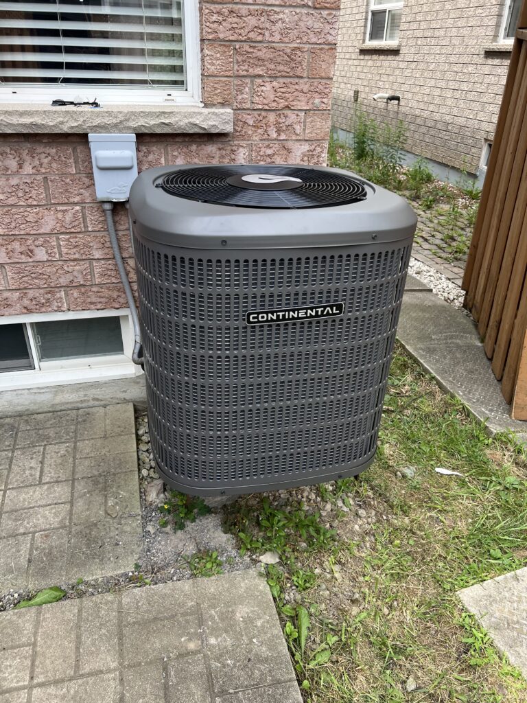 Continental central air conditioner outdoor condenser installed — Mississauga home