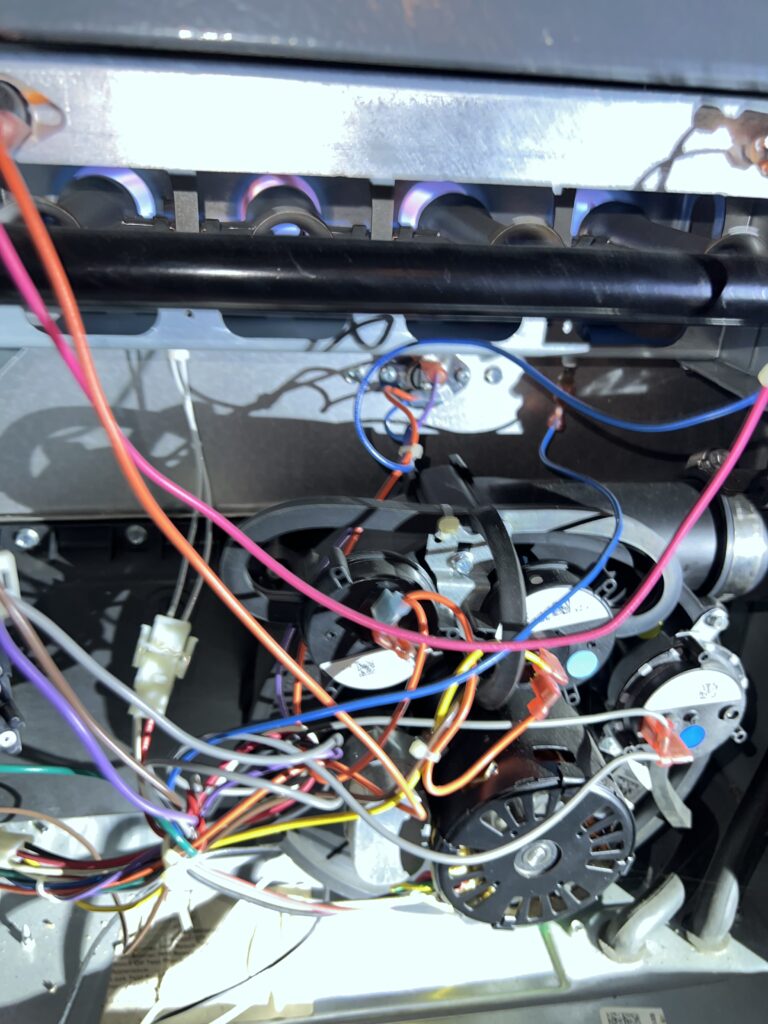 Furnace blower motor being serviced and repaired in a Mississauga home